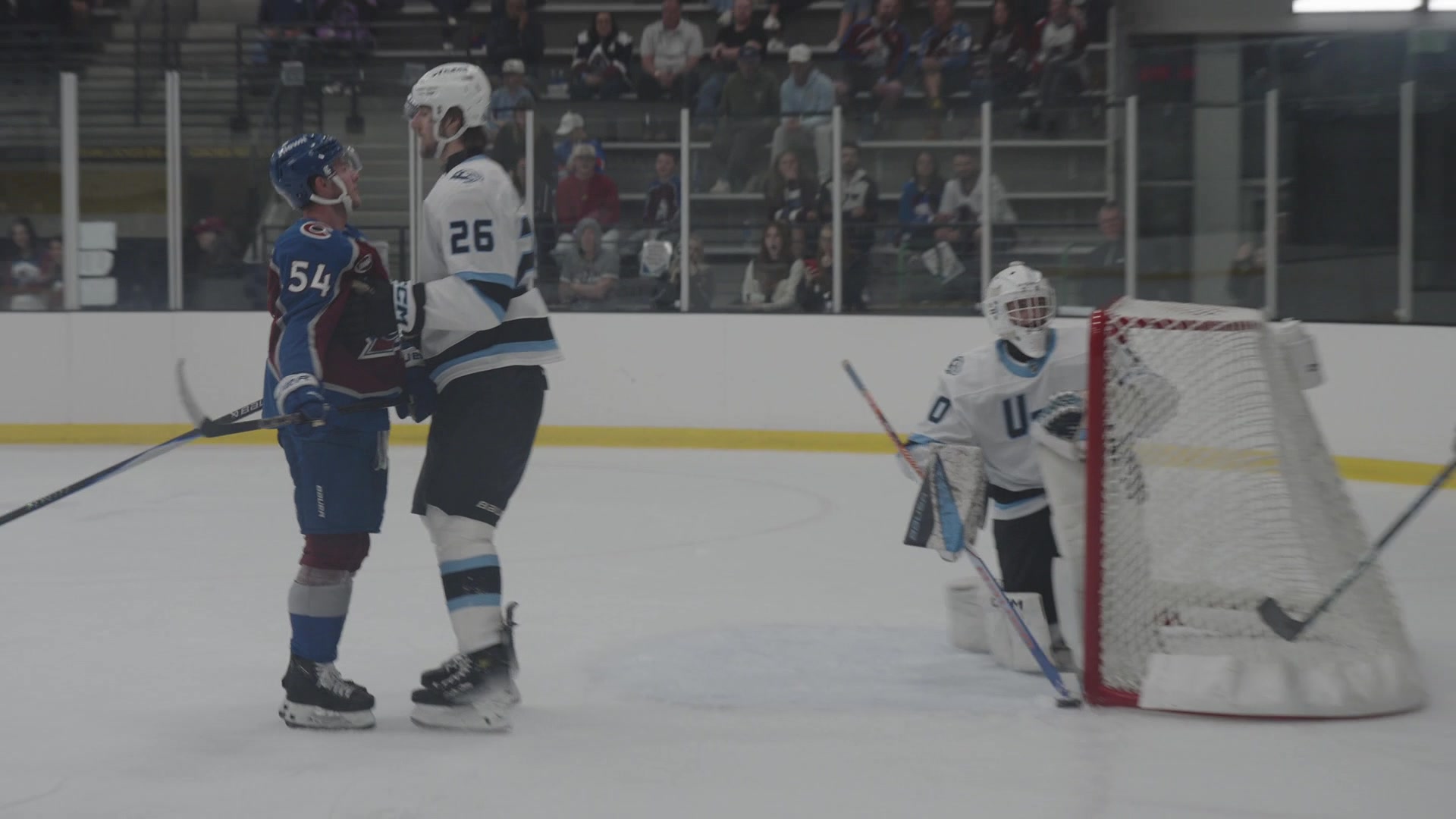 Gavin Brindley answers to Dmitry Simashev after searching for his own rebound after a net-front chance.