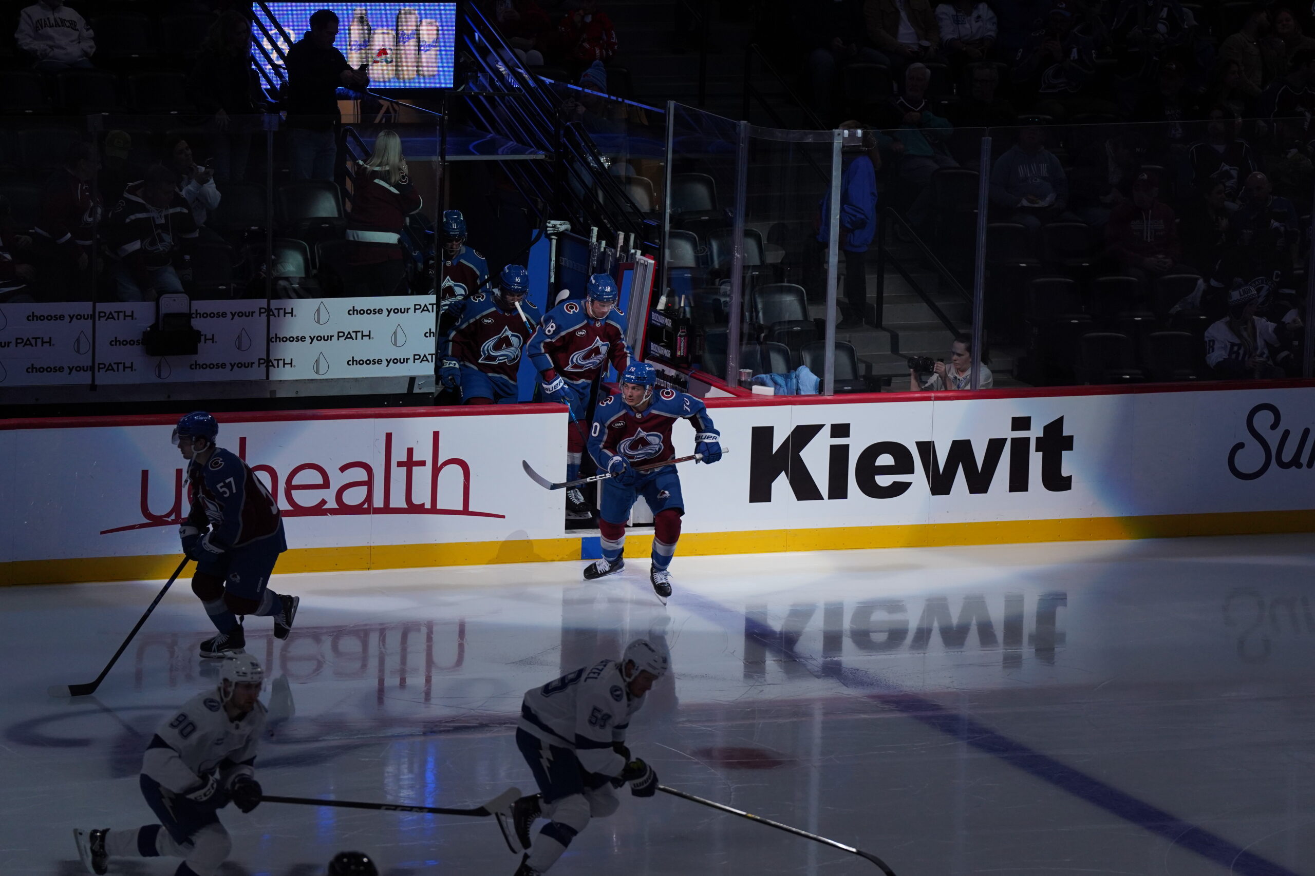 Sam Malinski stepping onto the ice at Ball Arena