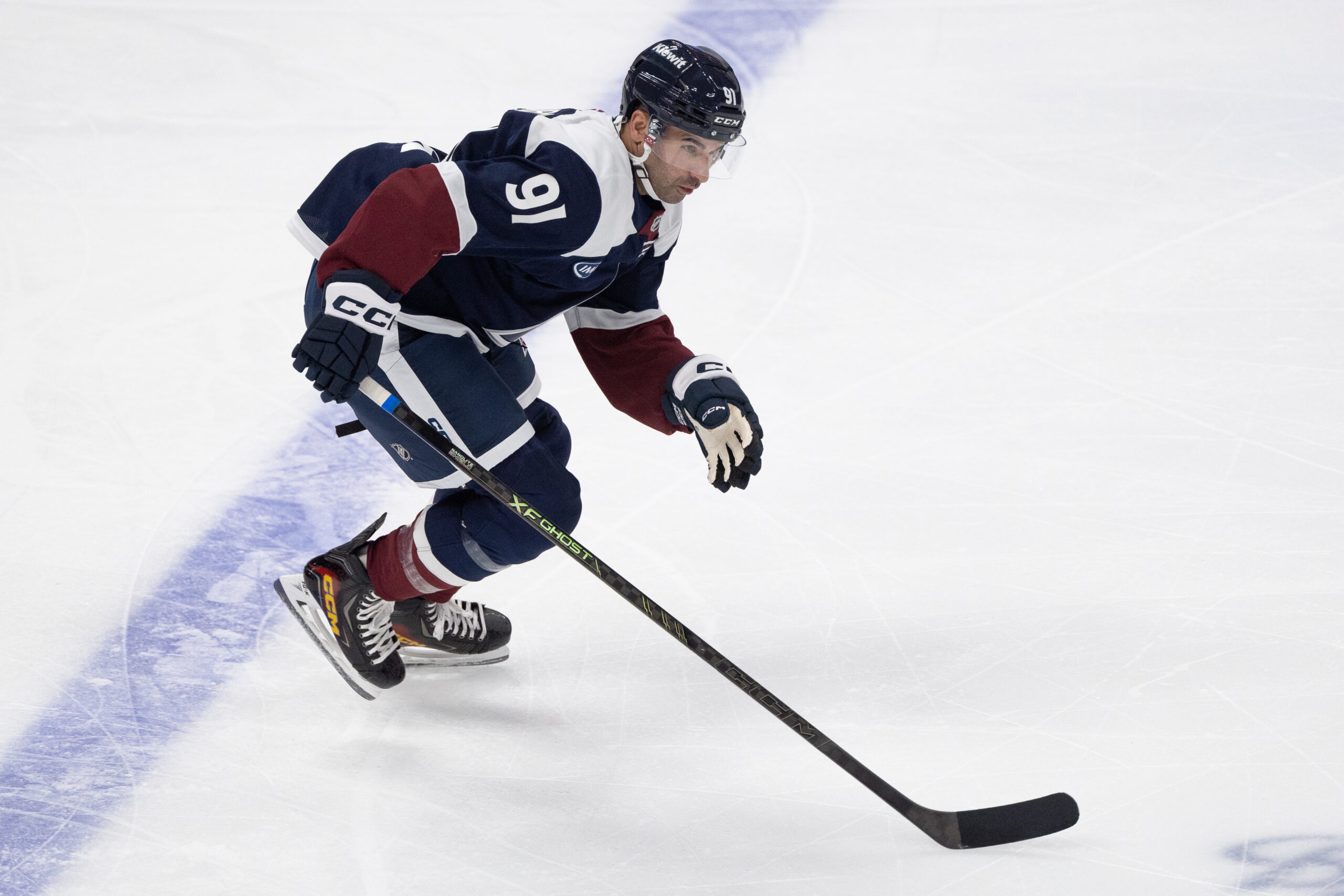 Nazem Kadri skating in Avs third jersey